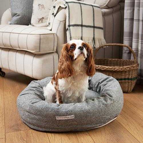 The Mutts and Hounds Donut Bed in tweed is affordable and machine-washable